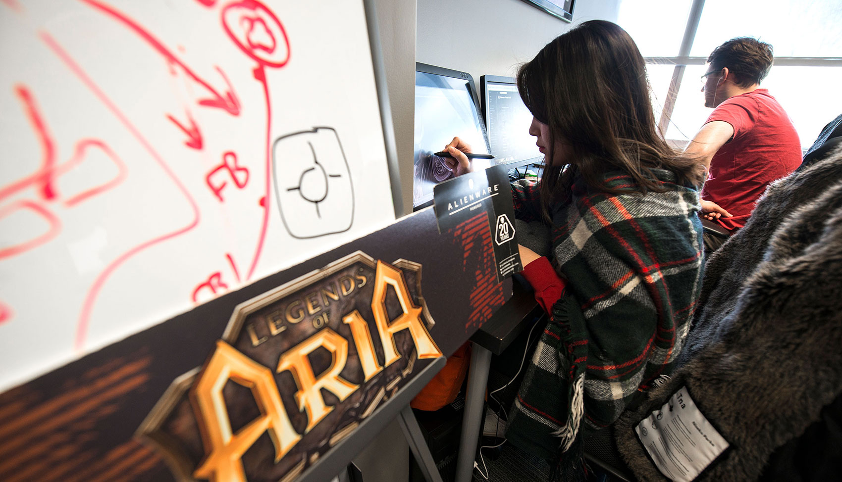 VSGI student works on artwork for Legends of Aria, a game that has been released to market and is still being actively developed. Its designing company, Citadel Studios, is an alumni of the Virginia Serious Game Institute. 