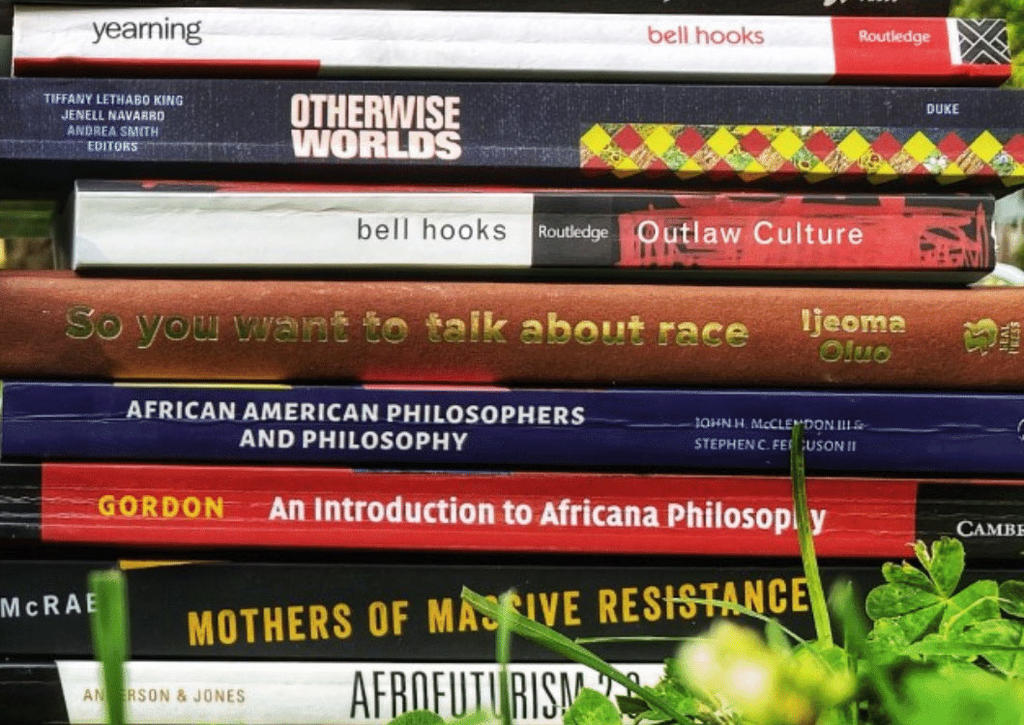 stack of books on anti racism